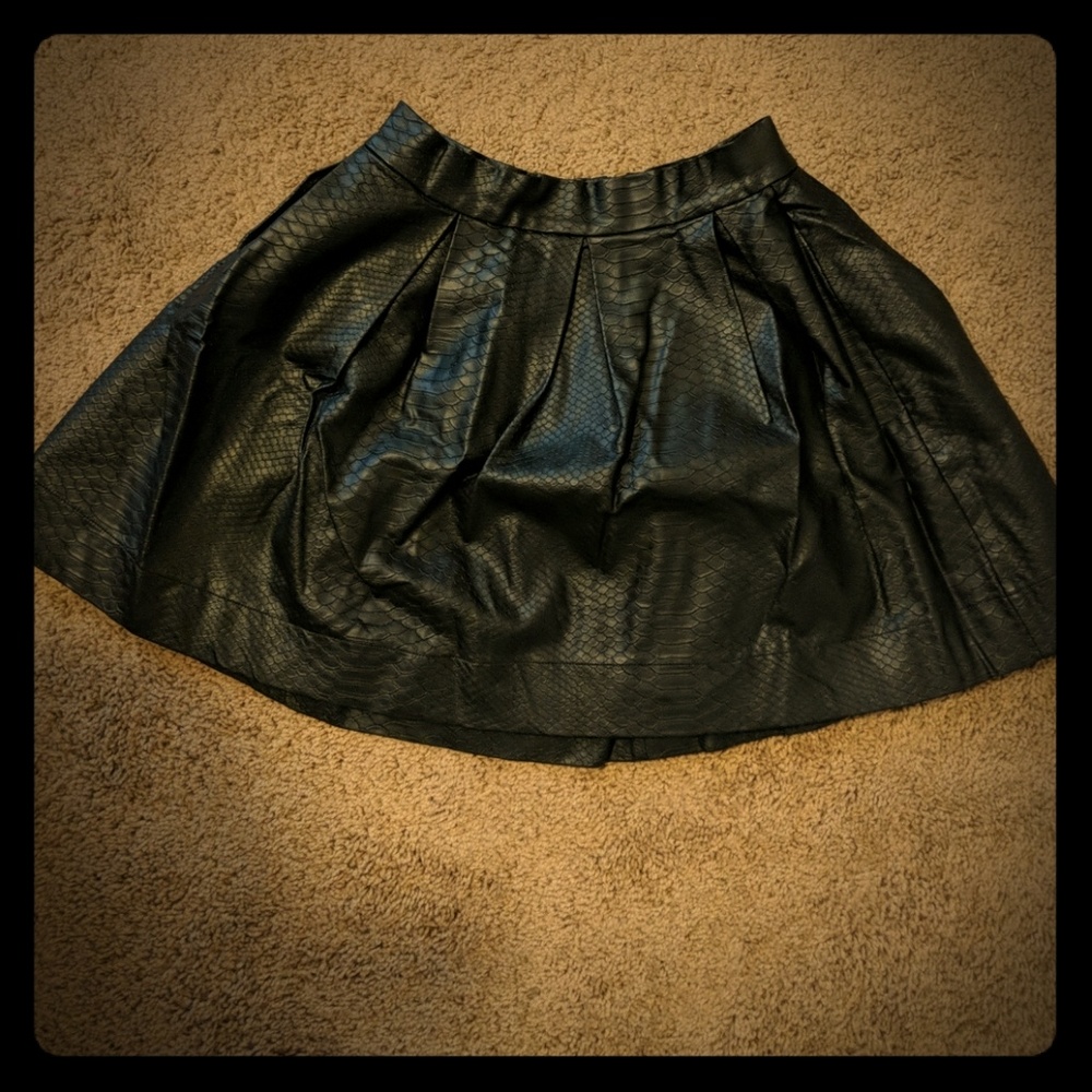 Black embossed "python leather"skater style skirt.